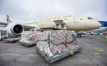 Dublin,Airport,10.03.2021,Loading,Of,Cargo,To,The,Freight,Aircraft, Dublin Airport 10.03.2021 Loading of cargo to the freight aircraft, Airplane in airport serviced by the ground crew before departure, airport workers handling airplane Ground Crew in the signal vest.